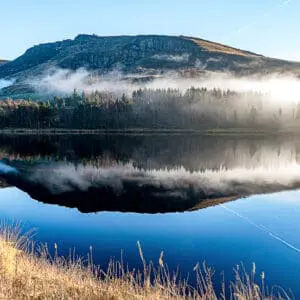 Hill’s misty reflection over Dove Stones