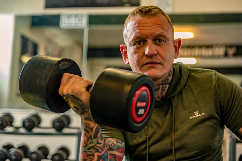 Man lifting in gym taken by Personal Branding Photographer