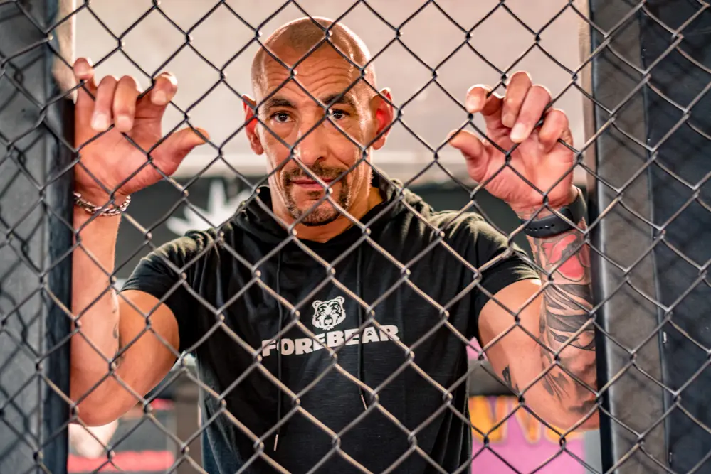 Man inside UCF cage taken by Personal Branding Photographer