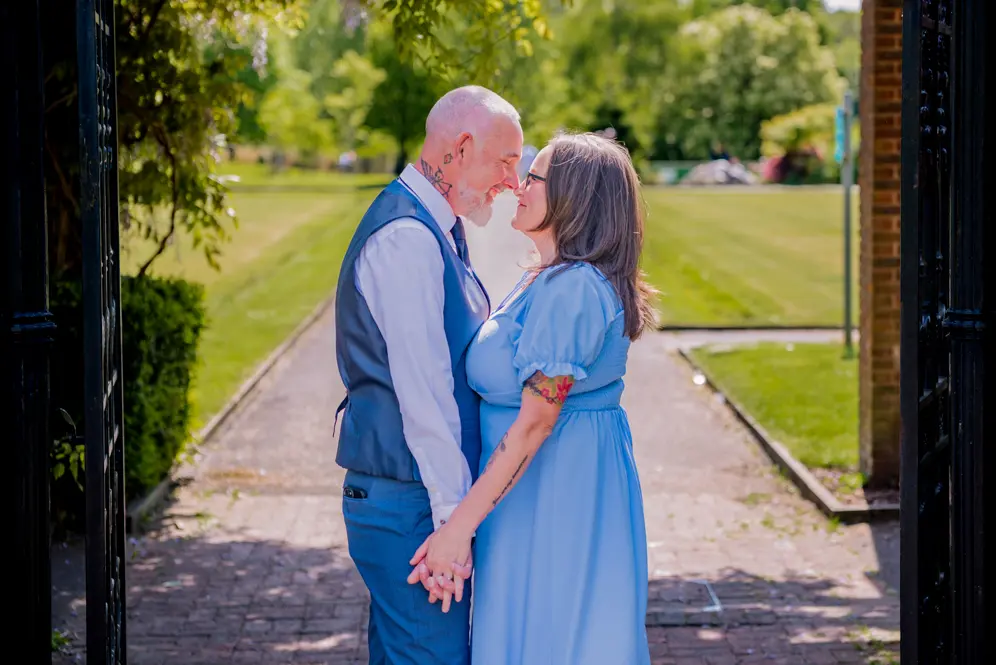 Close up of Couple's noses touching and hands holding during their engagement shoot at Alexandria Park, Oldham