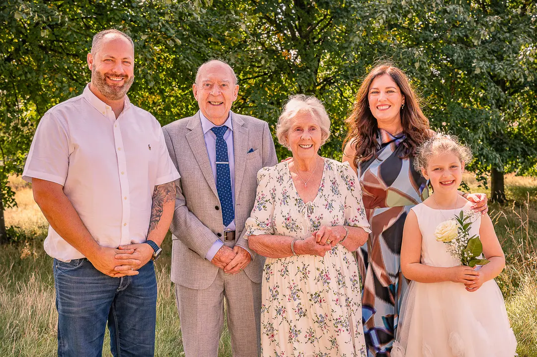 Older couple with younger family members at St Peter’s Church, Ashton-under-Lyne