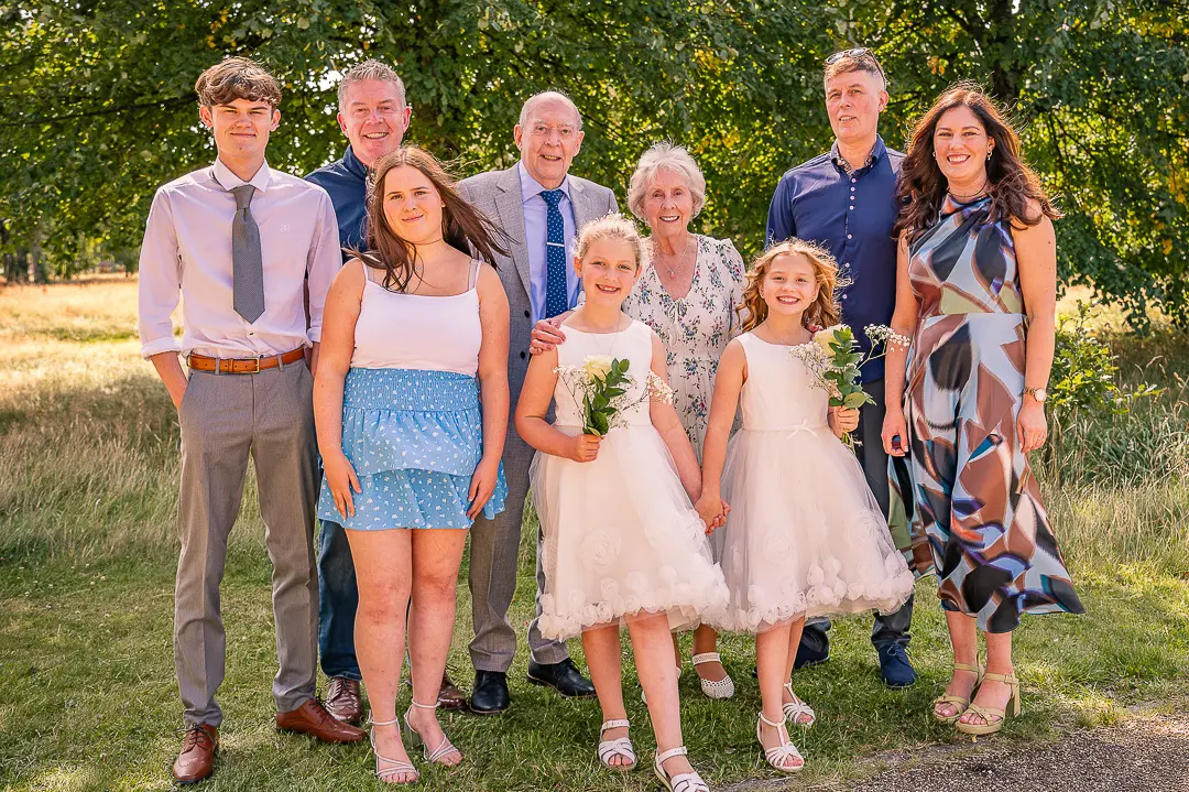 Dennis and Patricia with their son and extended family