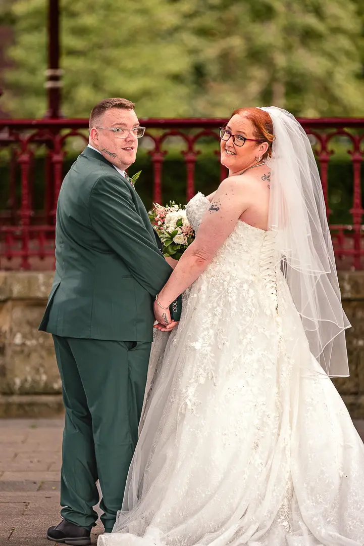 Bride and groom at Broadfield Park bandstand in Rochdale