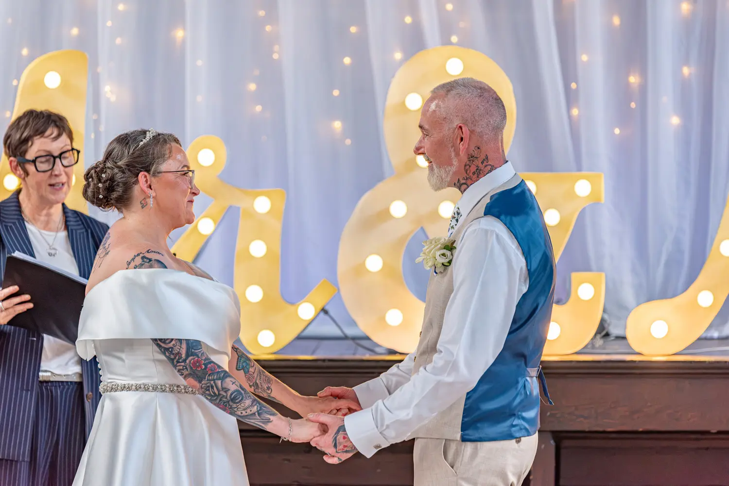The bride and groom exchanging their wedding vows