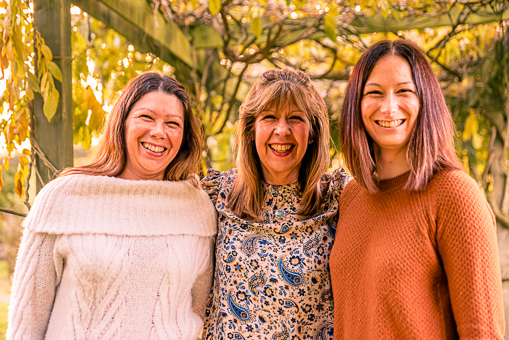 Outdoor Family Portrait of mother and 2 adult daughters