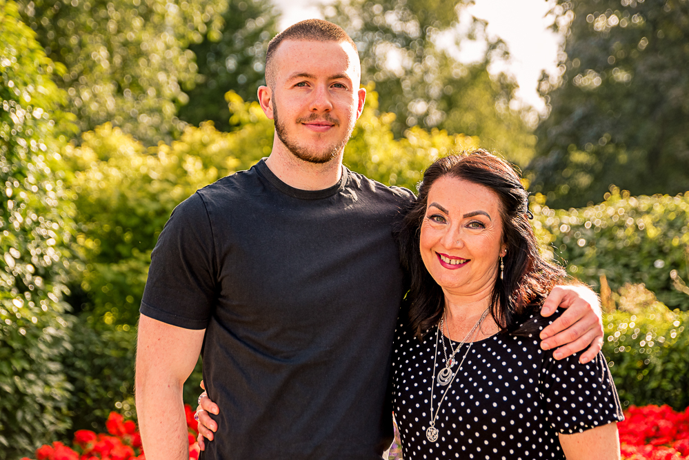 Outdoor Family Portrait of mother and young adult son