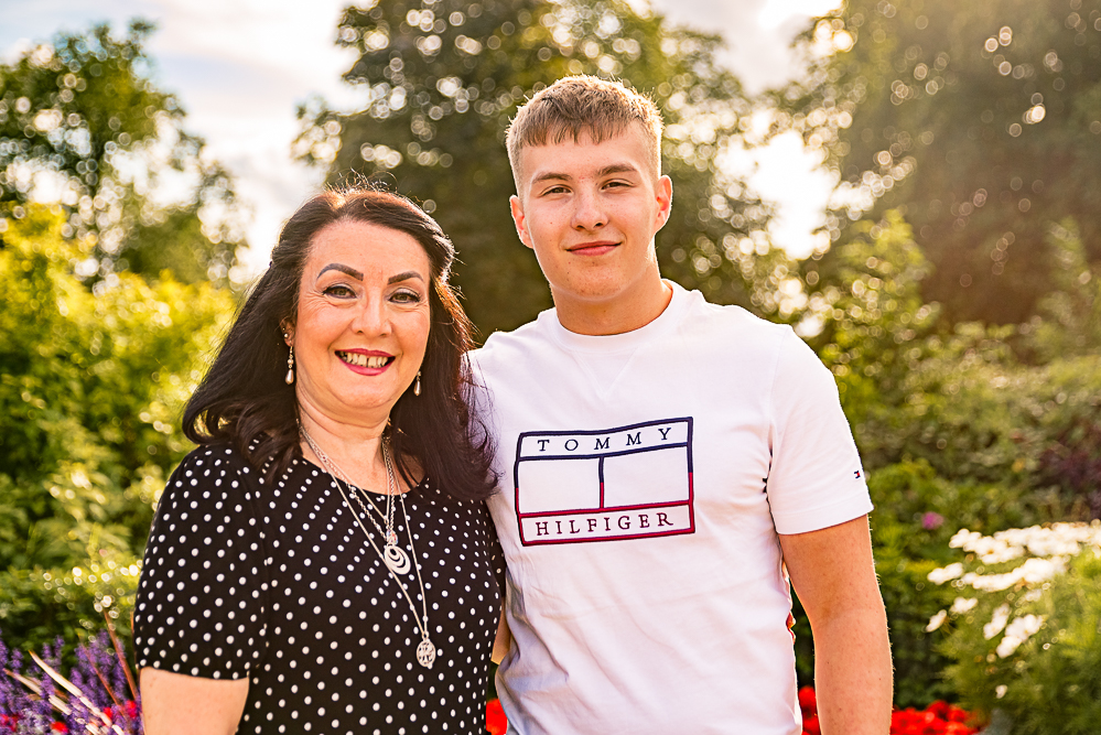 Outdoor Family Portrait of mother and young adult son