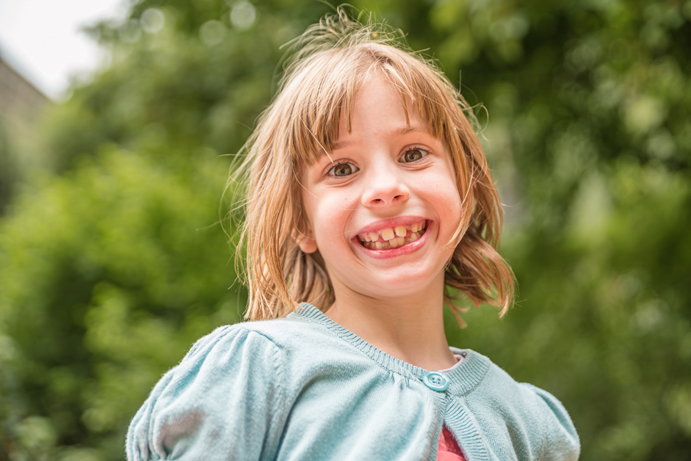 Outdoor Family Portrait of girl smiling