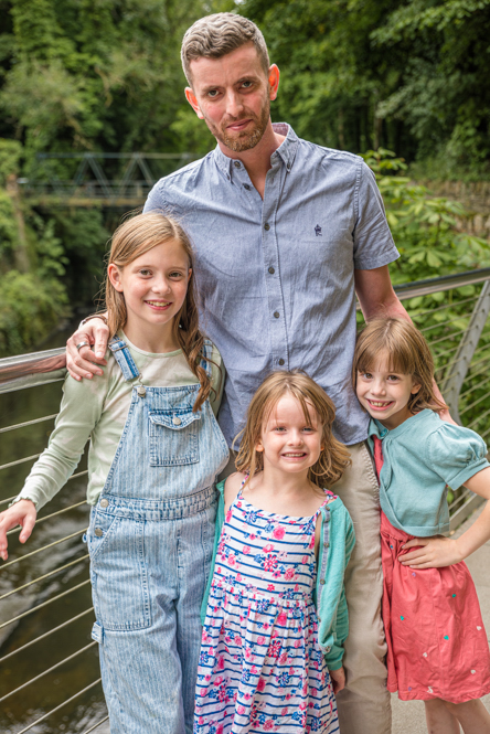 Outdoor Family Portrait of Dad with his 3 daughters