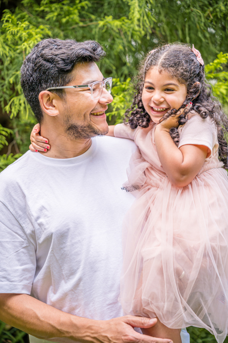 Outdoor Family Portrait of young daughter with Dad