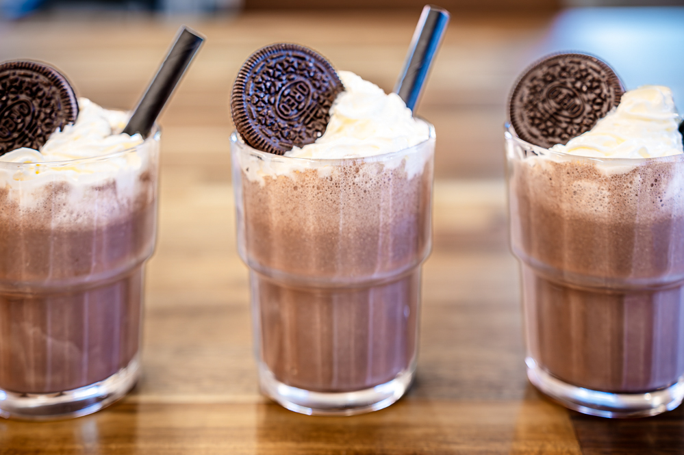 Three mini chocolate Oreo milkshakes
