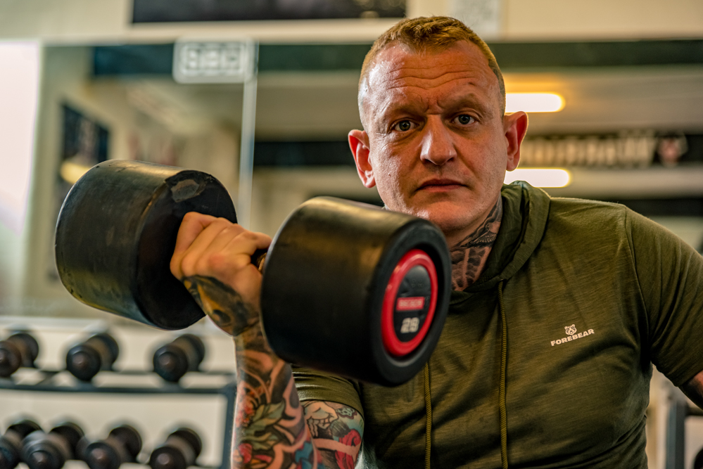 Man lifting in gym taken by Personal Branding Photographer