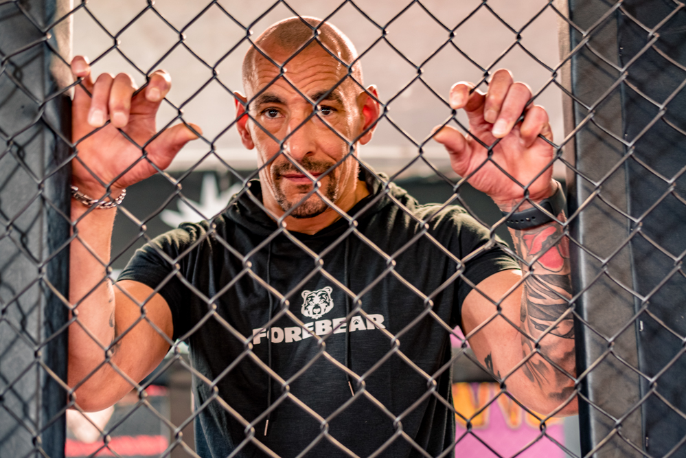 Man inside UCF cage taken by Personal Branding Photographer