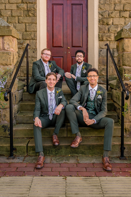 Groom and his three groomsmen on the steps of Peel Street Baptist Church, Accrington