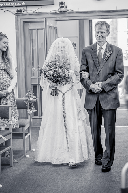 Bride and her father walking down the aisle at Peel Street Baptist Church, Accrington