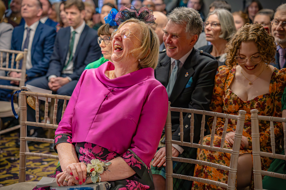 Mother of the bride laughing