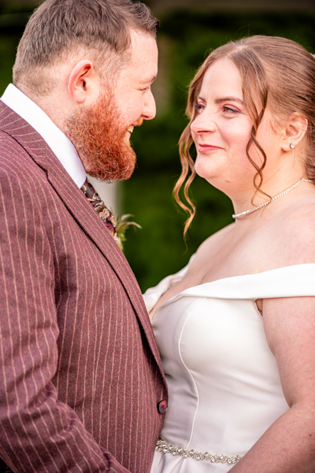 bride and groom looking at each other taken by Manchester Photographer Wedding Rebekah Morecroft
