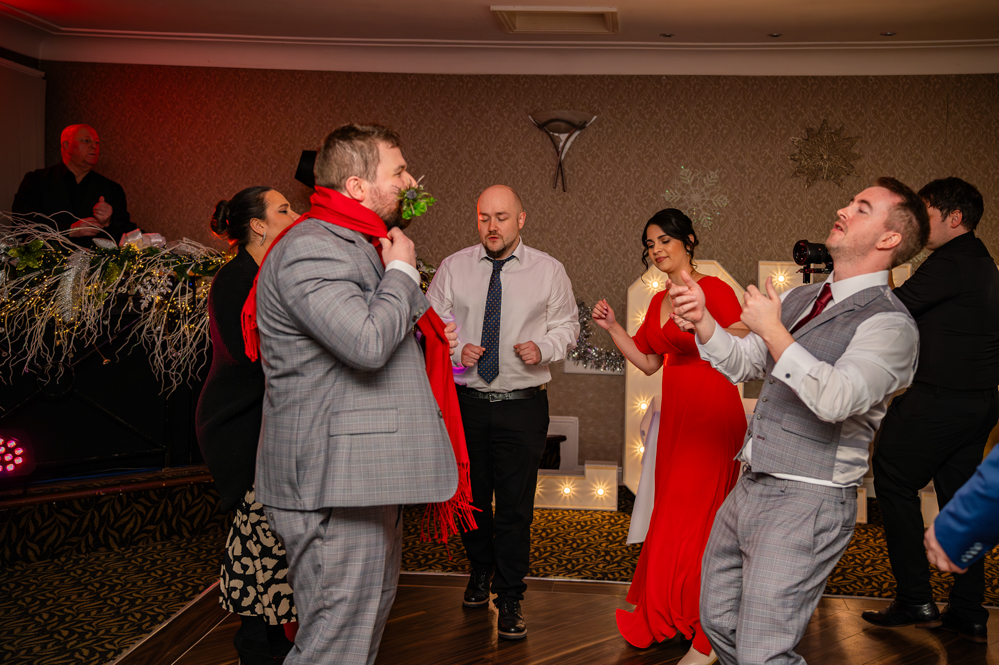 Wedding guests dancing