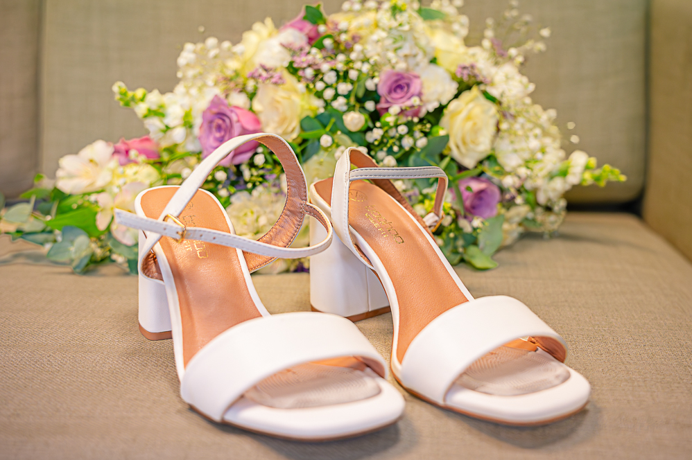 Brides sandals and flowers