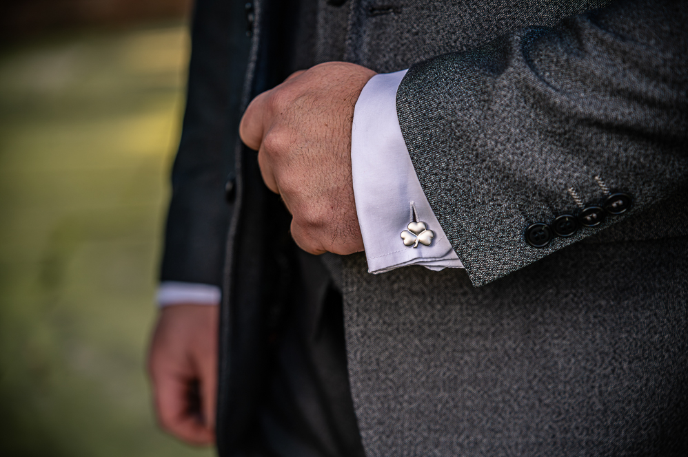 Close up of Grooms 3 leaf clover cuff link