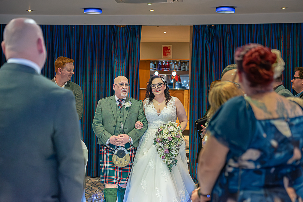 Bride and Father of the Bride walking down the aisle