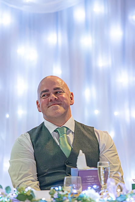 Groom with a big smile on his face.