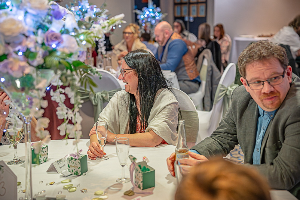 Group of wedding guests at table