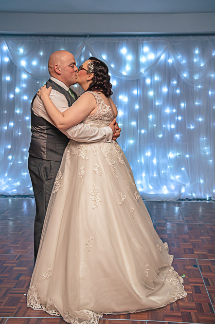 Bride and Groom kissing during first Dance.