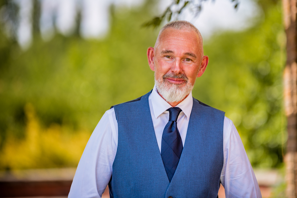 Close-up of man wearing a tie and waistcoat
