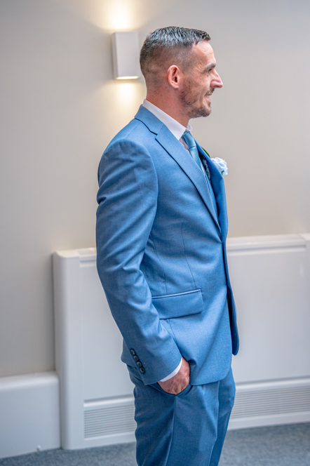 Groom smiling