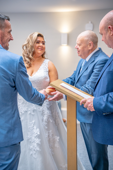 The father of the bride giving his daughter to the groom