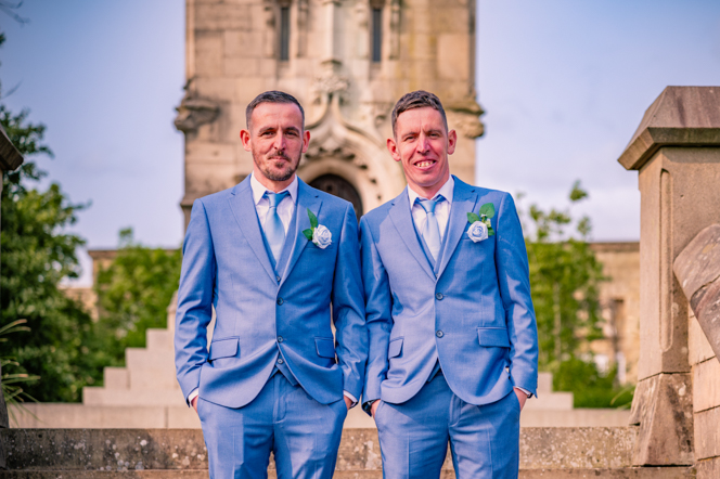 Groom and the best man smiling