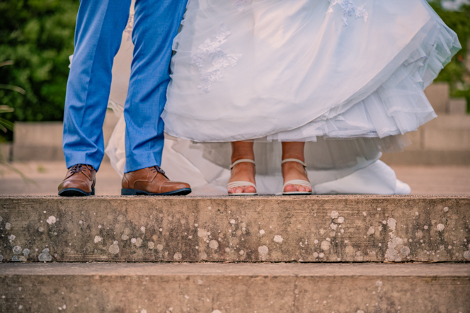 The shoes of a bride and groom