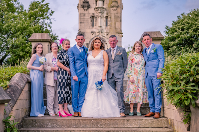 Family group photograph at whitehead garden, bury after a wedding ceremony.