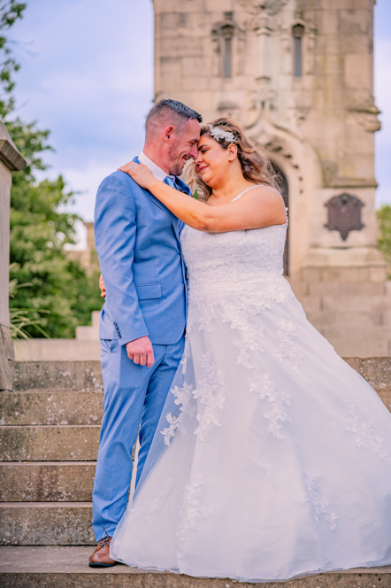 Romantic couple portrait in Whitehead Garden after a Bury wedding ceremony.