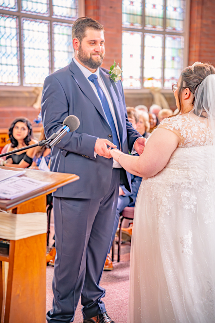 Bride and groom holding hands