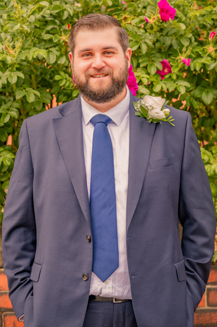 Groom smiling before ceremony at Metro Christian Centre Bury