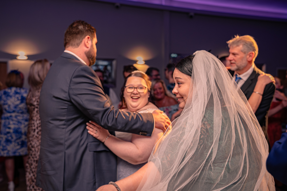 Wedding guests dancing at Bury reception