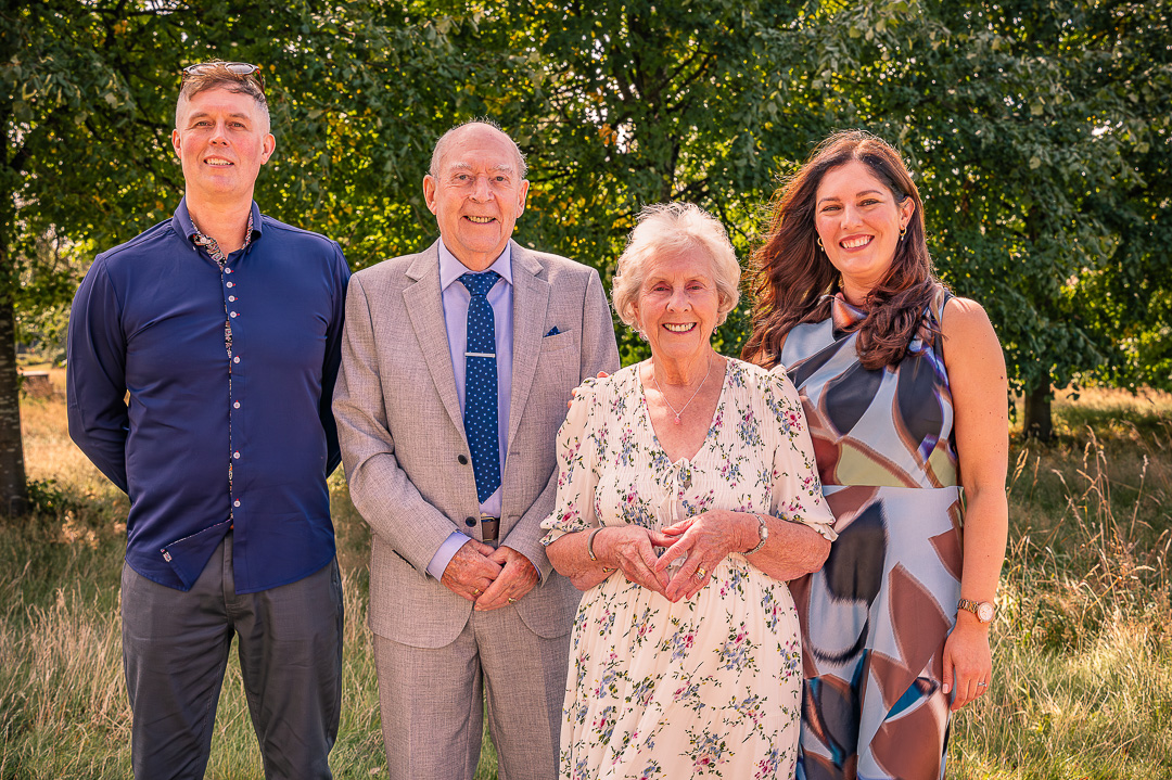 Older couple with two adult grandchildren at St Peter’s Church, Ashton-under-Lyne