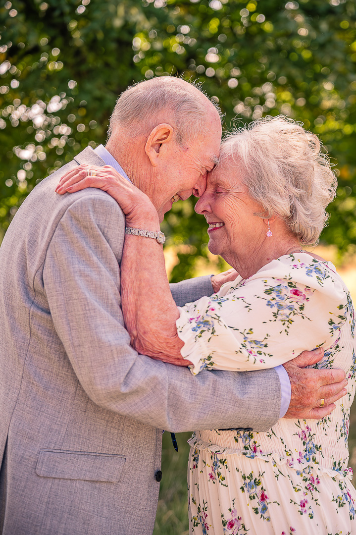 Dennis and Patricia sharing a quiet moment after renewing their vows at St Peter’s Church, Ashton-Under-Lyne.