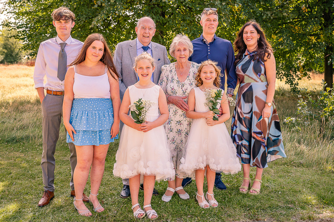 A beautiful multi-generational family portrait celebrating 70 years of marriage