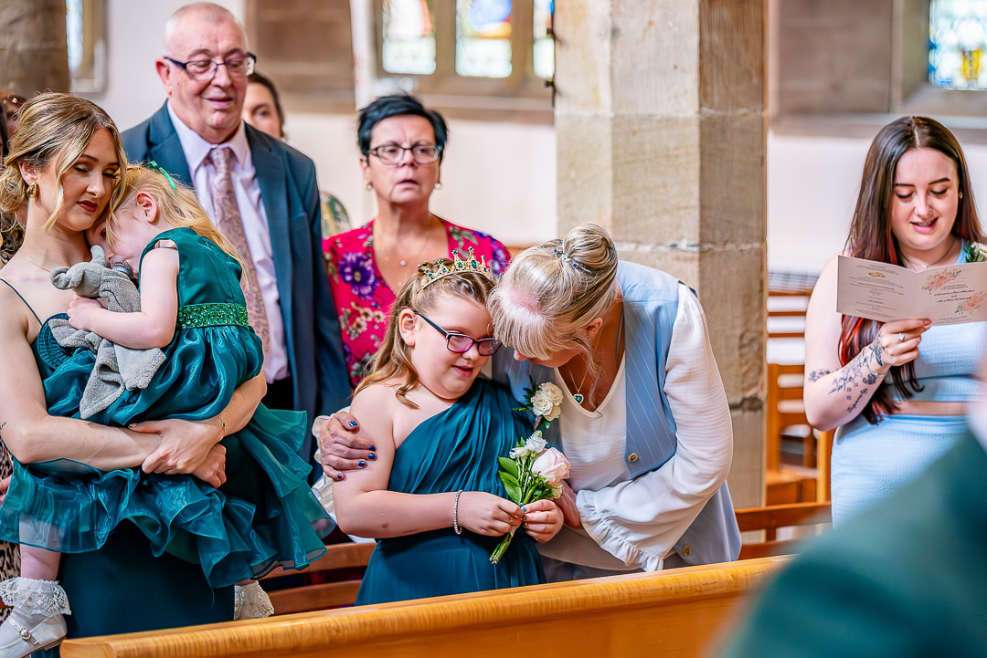 Wedding guests enjoying the church service