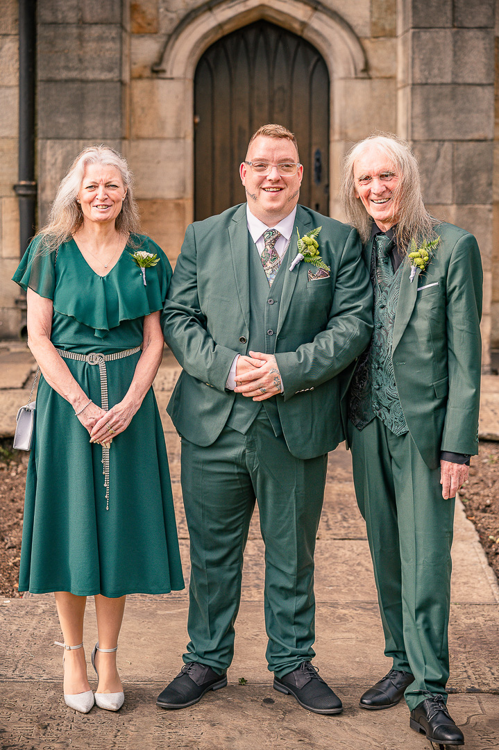 Groom with his parents outside St Chad’s Church following the ceremony