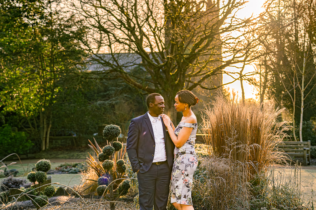 Romantic engagement portrait in morning light at Parsonage Gardens Manchester.
