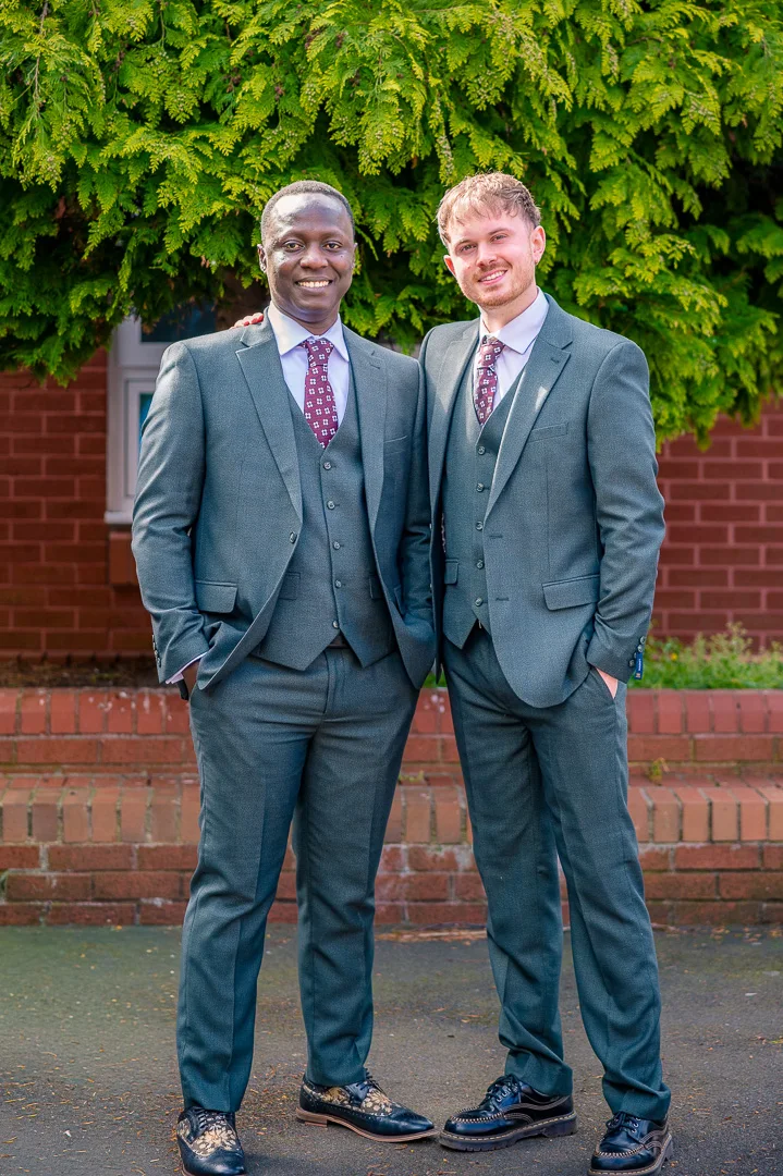 Abraham and his best man at William Hulme's Grammar School for their wedding blessing in Manchester