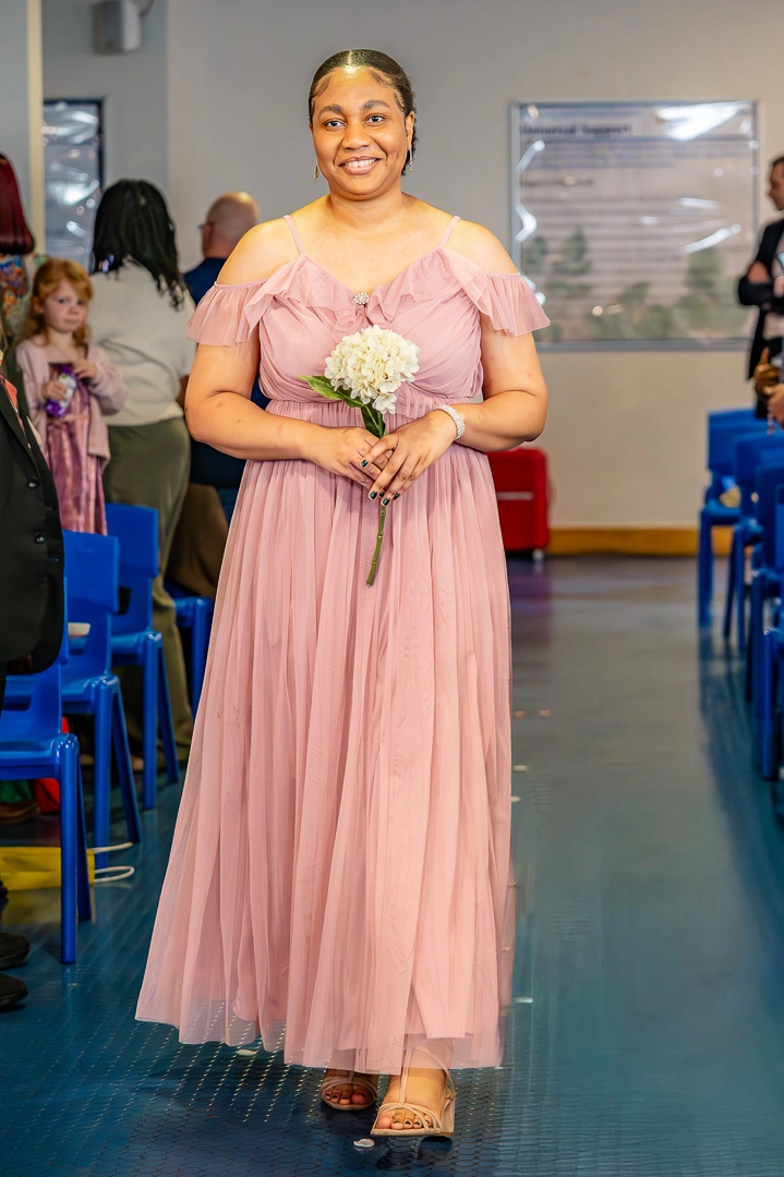 Brides walking down the aisle at Bea and Abraham's wedding blessing at William Hulme's Grammar School, Manchester