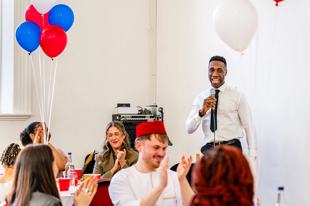 Bride’s brother giving a speech at 422 Community Hub, Ardwick, Manchester, during Bea and Abraham's wedding reception